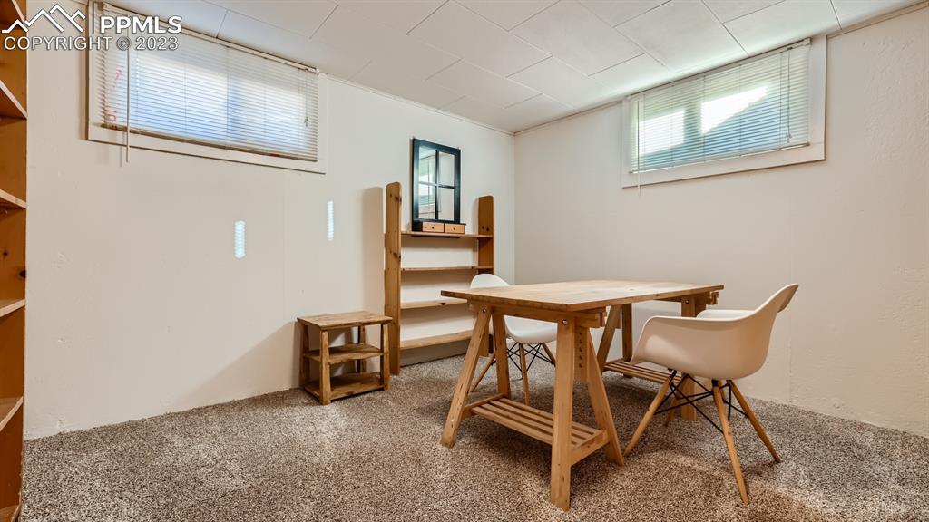 530 Valley Road Colorado Springs, CO 80904 - Photo 35 of 50 a view of a room that has a table and chairs in it