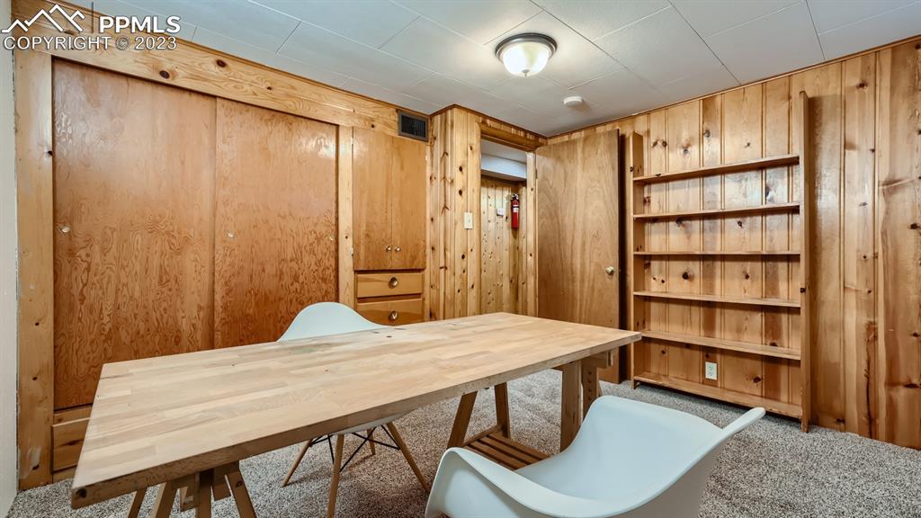 530 Valley Road Colorado Springs, CO 80904 - Photo 36 of 50 a large bedroom with a bed and a cabinet