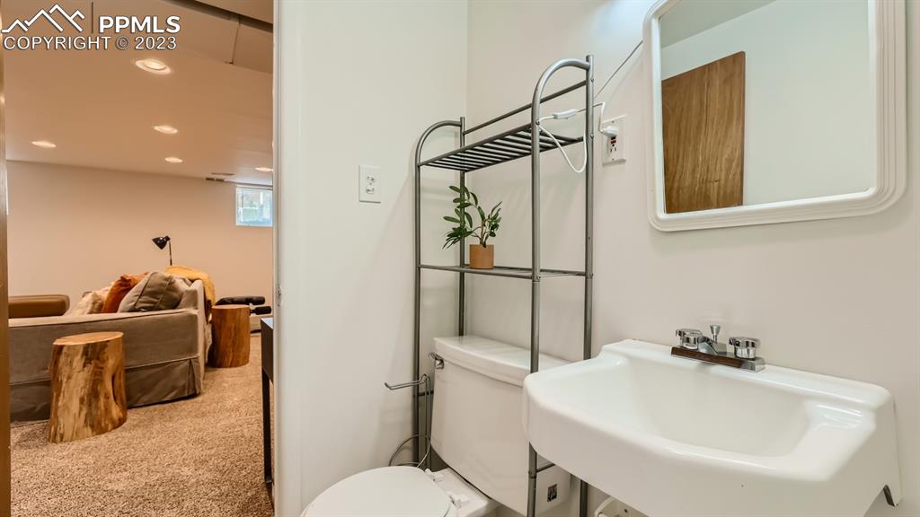 530 Valley Road Colorado Springs, CO 80904 - Photo 39 of 50 a bathroom with a sink toilet and shower