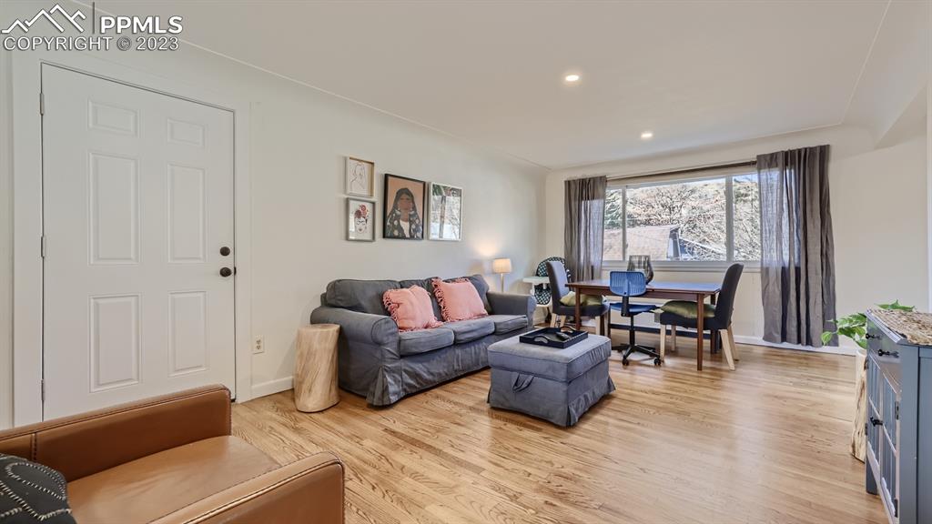 530 Valley Road Colorado Springs, CO 80904 - Photo 4 of 50 a living room with furniture and large windows