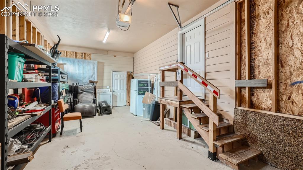 530 Valley Road Colorado Springs, CO 80904 - Photo 42 of 50 a view of entryway with workspace and stairs