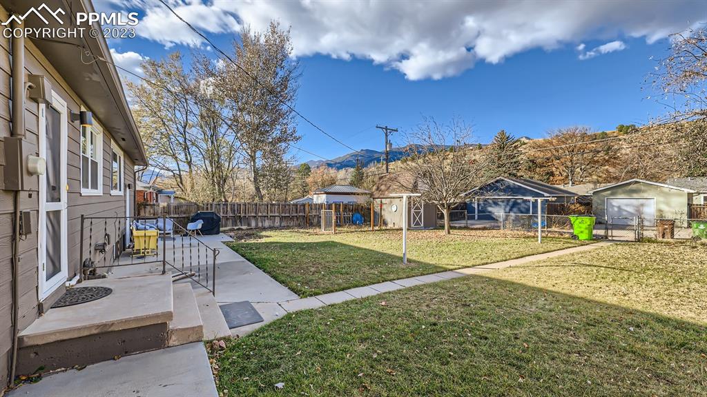 530 Valley Road Colorado Springs, CO 80904 - Photo 45 of 50 a view of a house with a yard