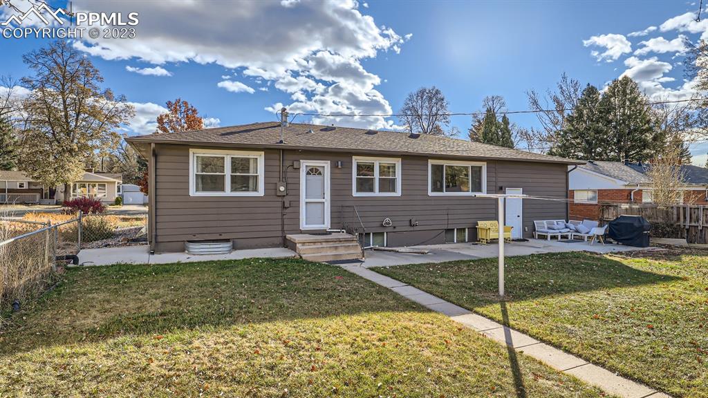 530 Valley Road Colorado Springs, CO 80904 - Photo 48 of 50 a view of a house with a yard and sitting area