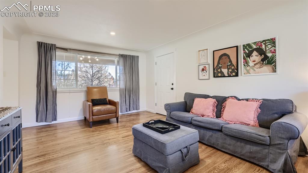 530 Valley Road Colorado Springs, CO 80904 - Photo 7 of 50 a living room with furniture and a large window