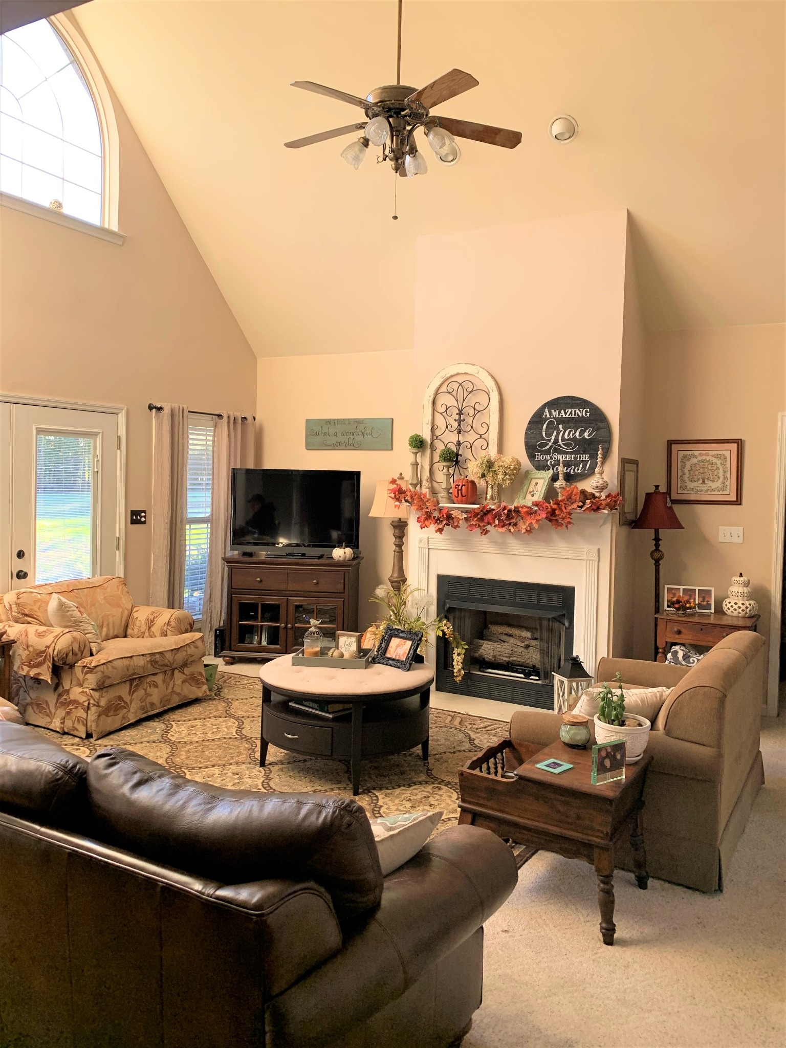 83 Old Quick Road Fayetteville, TN 37334 - Photo 23 of 41 a living room with furniture a flat screen tv and a fireplace
