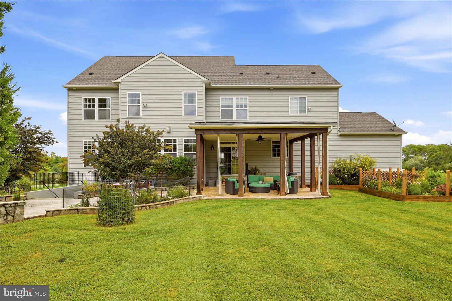 15547 Montresor Road Leesburg, VA 20176 - Photo 68 of 92 Rear elevation with covered patio