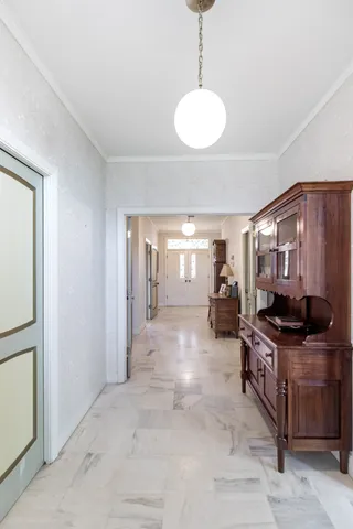 a living room with furniture flat screen tv and a fireplace