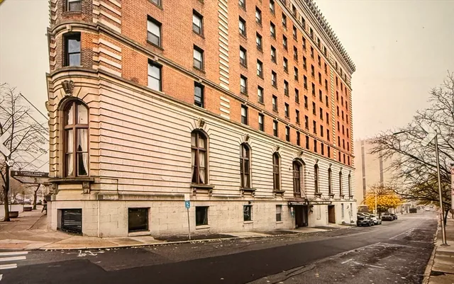 a view of a building with a street