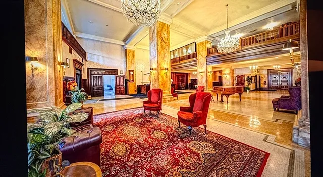 a outdoor space with lots of furniture and water view