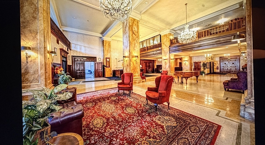 140 Chestnut Street, Unit 604 Springfield, MA 01103 - Photo 4 of 21 a outdoor space with lots of furniture and water view