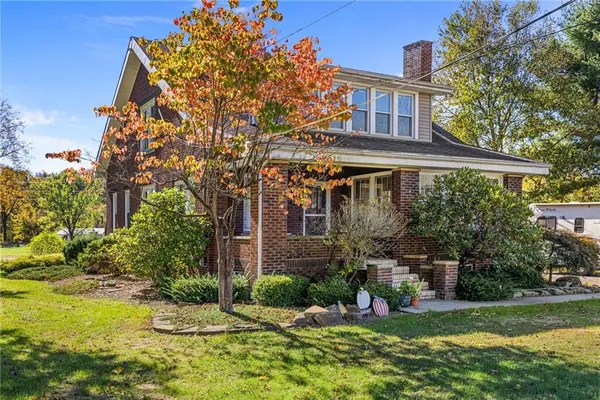 a front view of house with yard