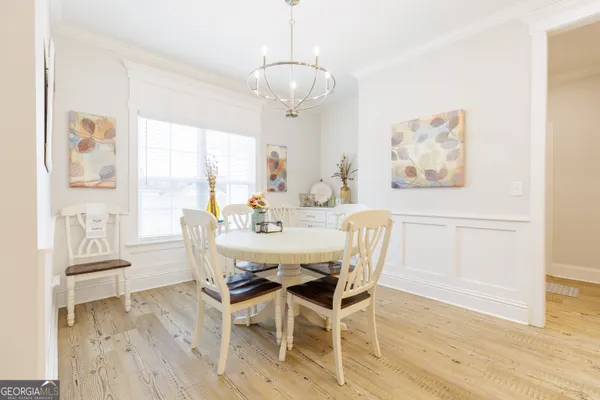 a bathroom with a granite countertop sink mirror and shower