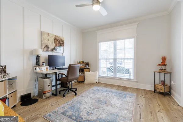 a bathroom with a granite countertop sink double and mirror