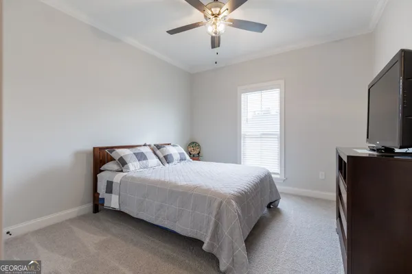 a room with furniture and wooden floor