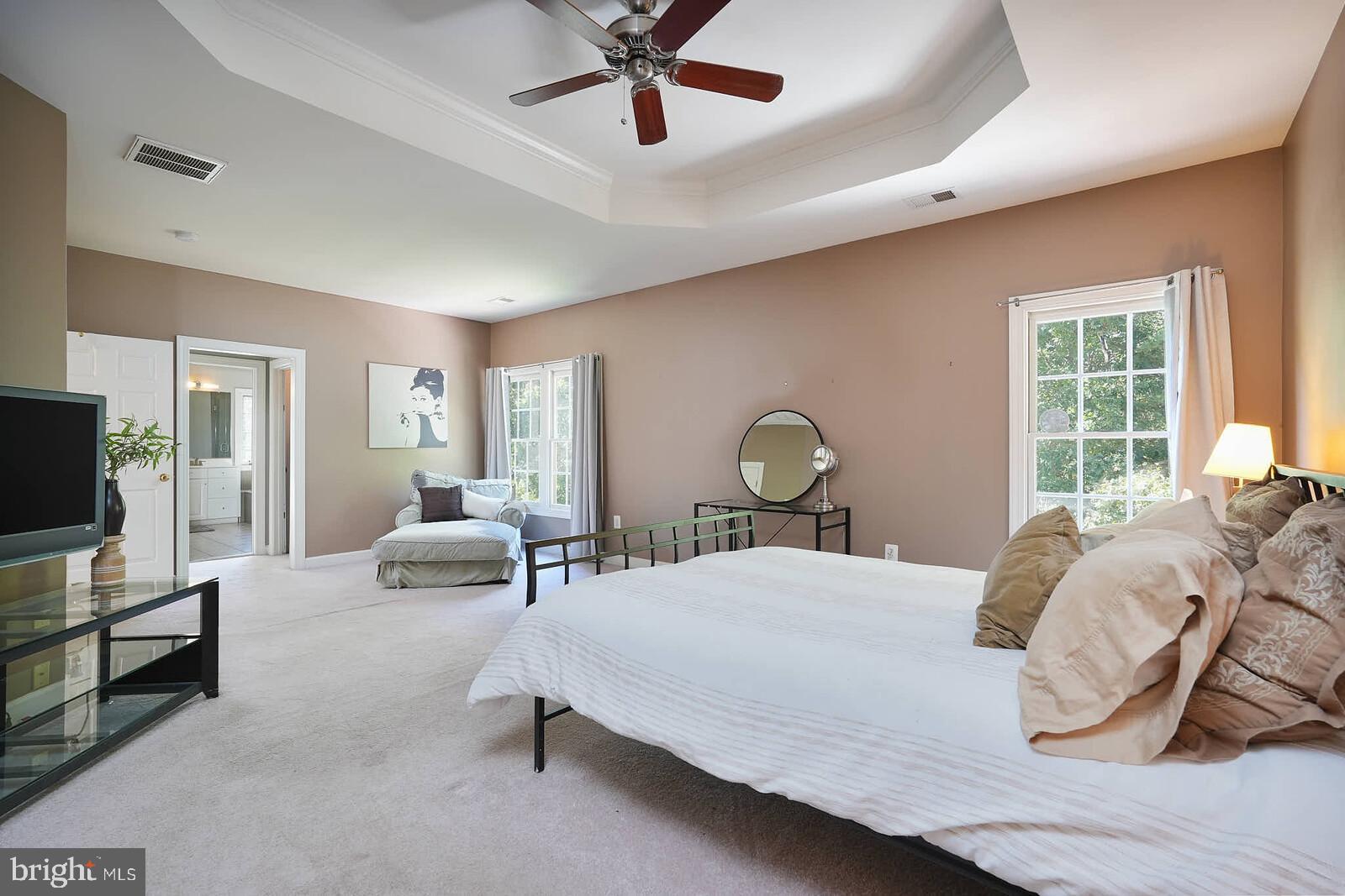 13014 English Turn Drive Silver Spring, MD 20904 - Photo 7 of 10 a bedroom with a bed and couch