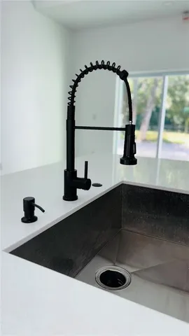 a view of kitchen and utility room