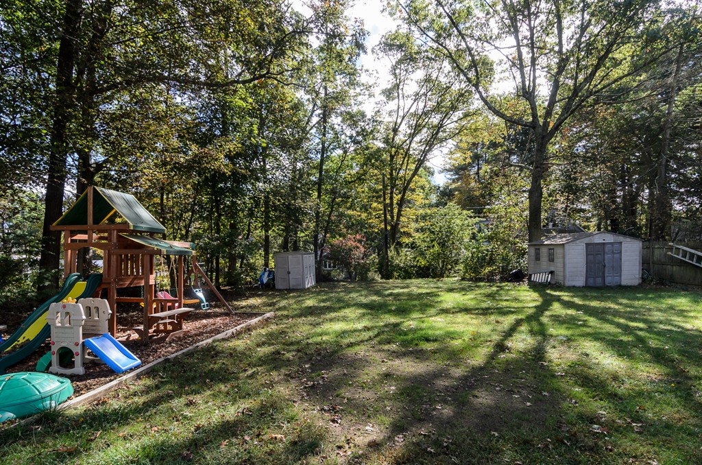30 Birch Road Natick, MA 01760 - Photo 20 of 21 a view of a wooden deck and a backyard
