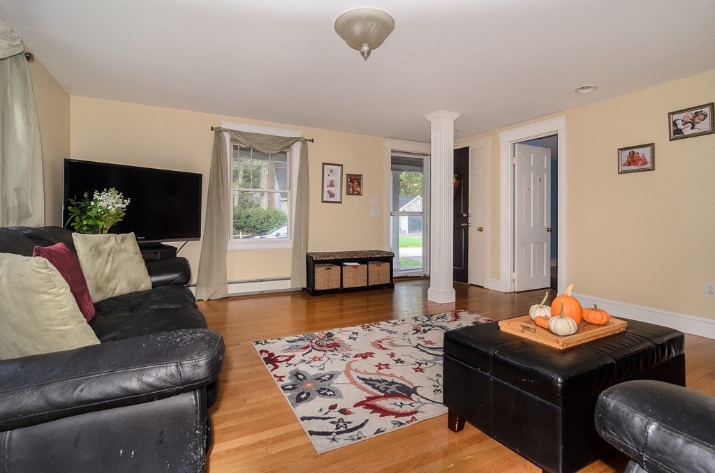 30 Birch Road Natick, MA 01760 - Photo 2 of 21 a living room with furniture and wooden floor