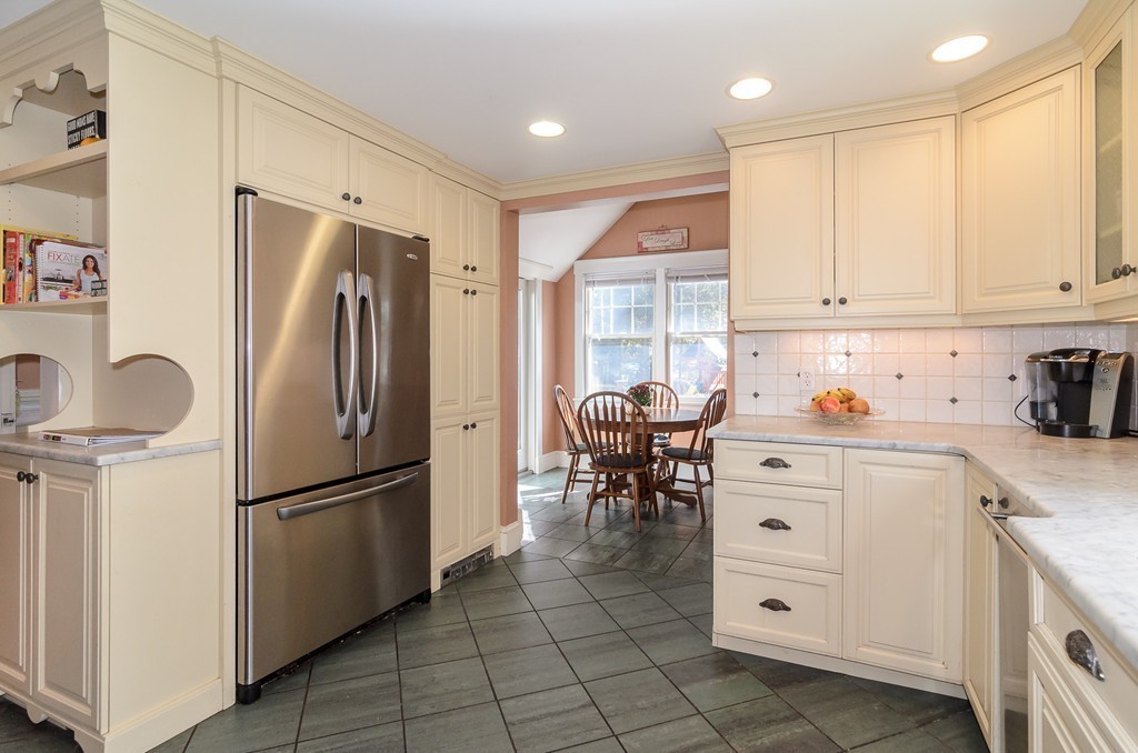 30 Birch Road Natick, MA 01760 - Photo 6 of 21 a kitchen with stainless steel appliances granite countertop a refrigerator sink and cabinets