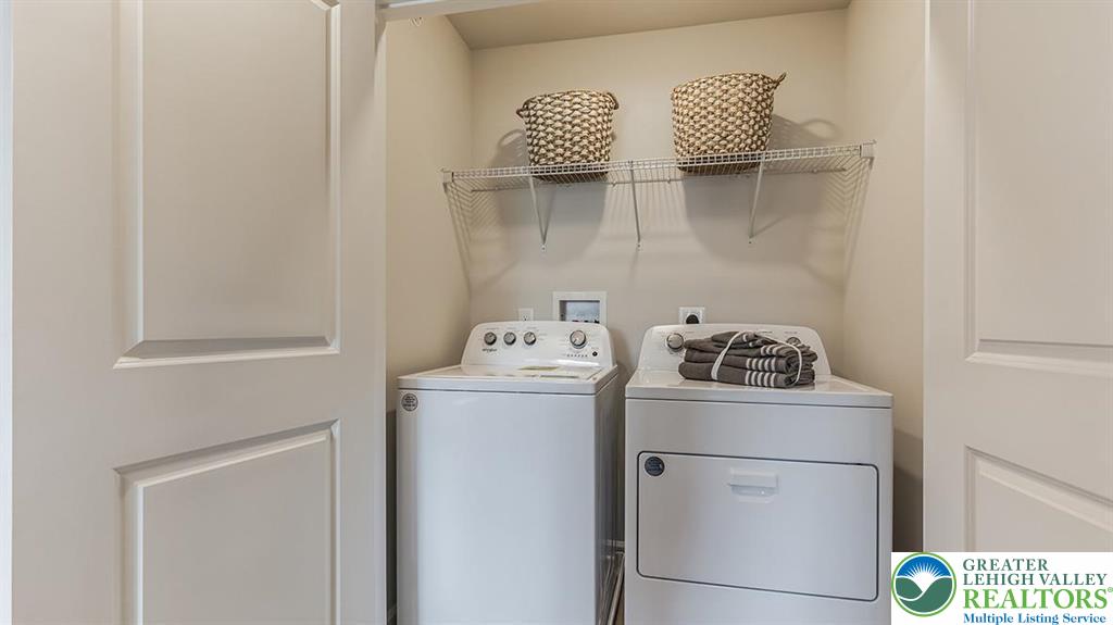 1151 Martin Road Breinigsville, PA 18031 - Photo 19 of 25 a utility room with dryer and washer