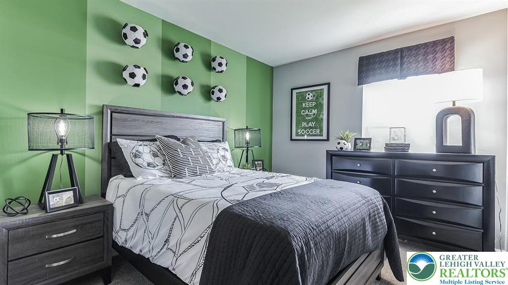 1151 Martin Road Breinigsville, PA 18031 - Photo 22 of 25 a bedroom with a bed and a dresser