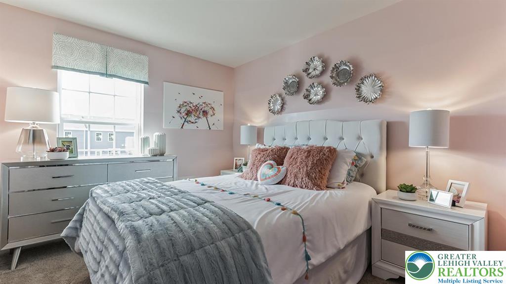 1151 Martin Road Breinigsville, PA 18031 - Photo 24 of 25 a bedroom with a bed and a window