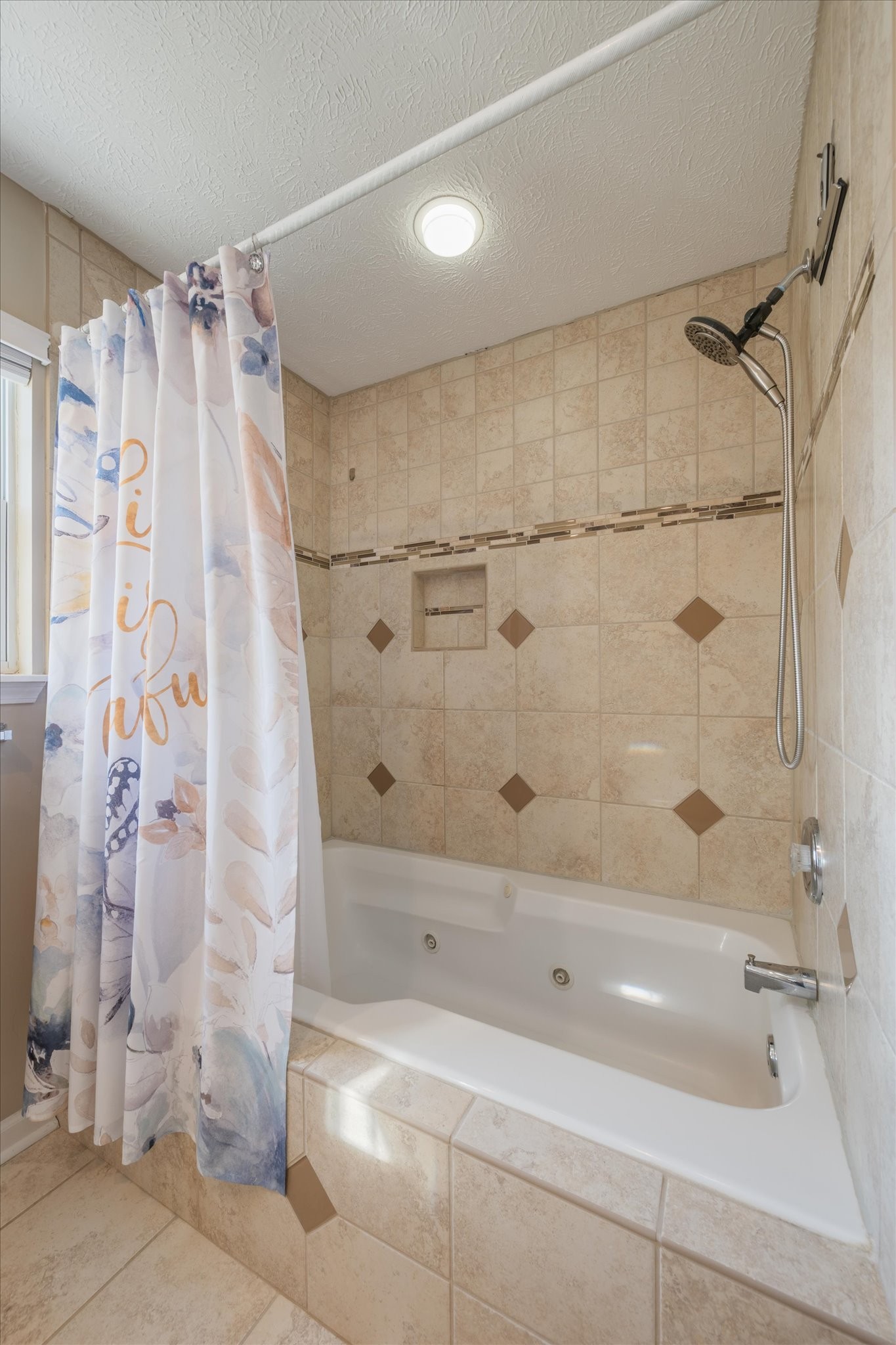 560 Windy Road Mount Juliet, TN 37122 - Photo 15 of 40 a bathroom with a shower and a tub