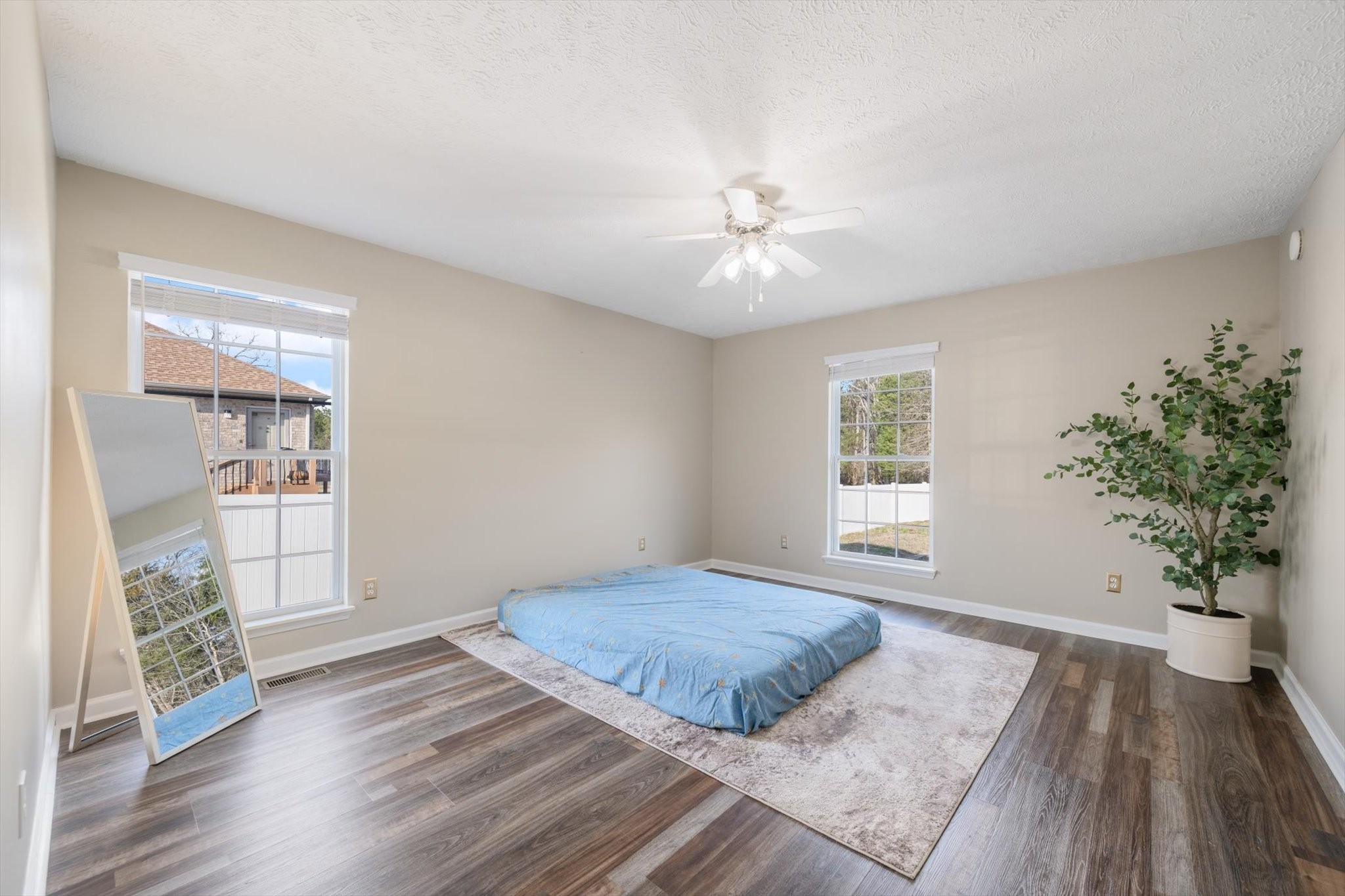 560 Windy Road Mount Juliet, TN 37122 - Photo 17 of 40 a view of an empty room with window and wooden floor
