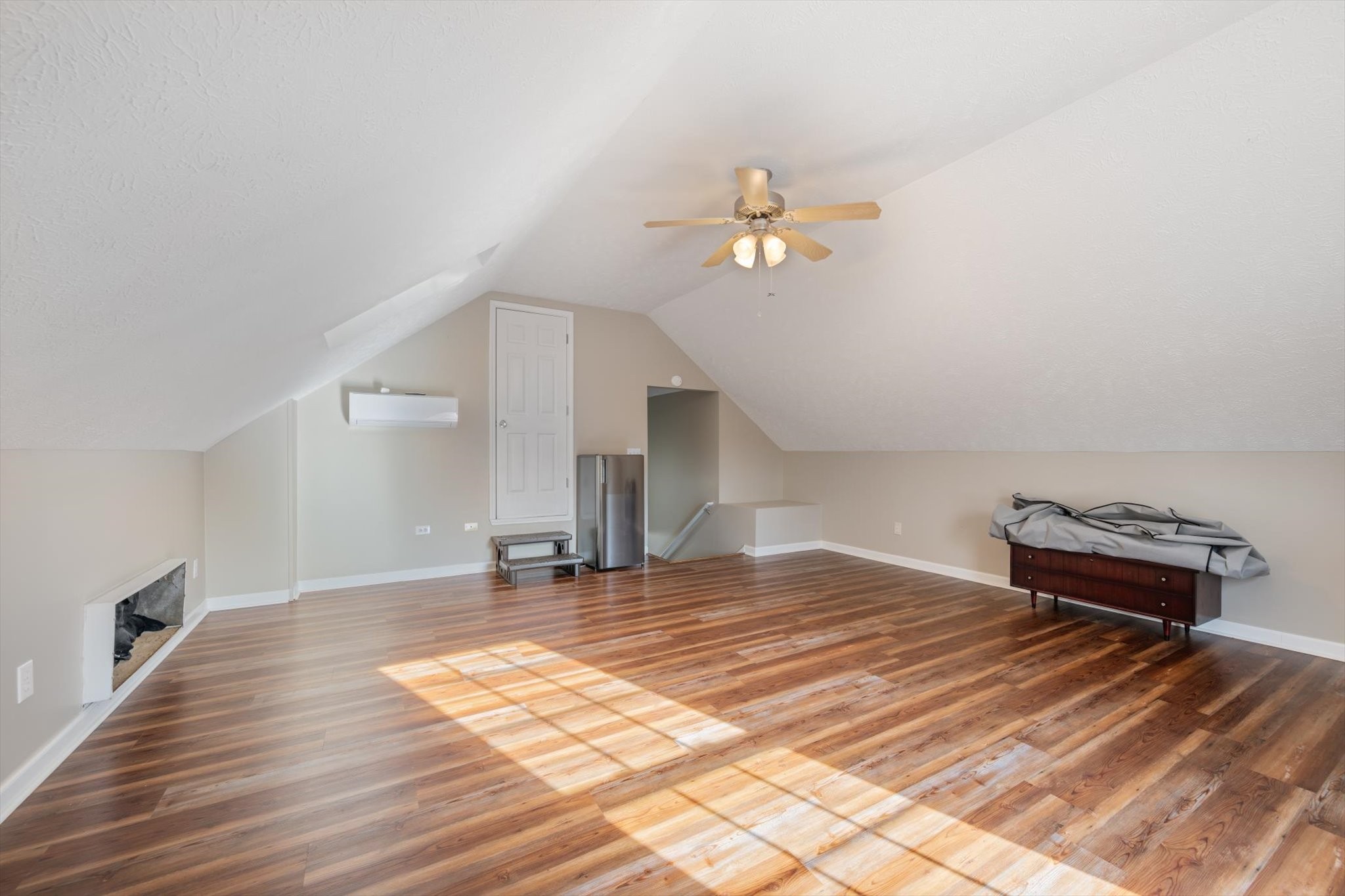 560 Windy Road Mount Juliet, TN 37122 - Photo 22 of 40 a view of empty room with wooden floor and fan