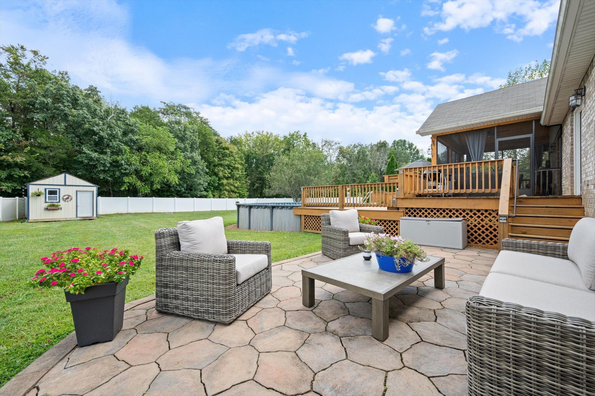 560 Windy Road Mount Juliet, TN 37122 - Photo 25 of 40 a view of a patio with couches table and chairs and potted plants