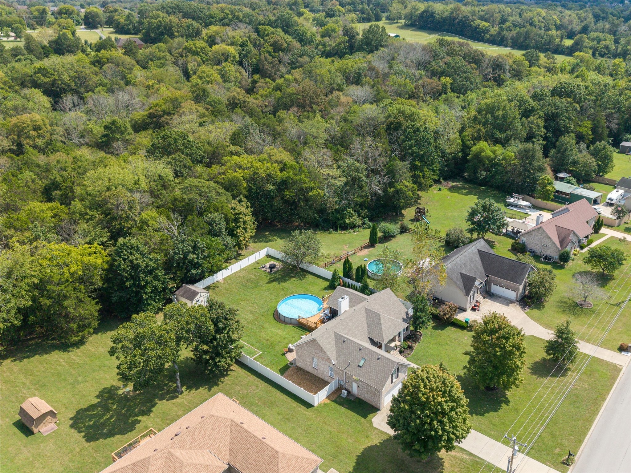 560 Windy Road Mount Juliet, TN 37122 - Photo 34 of 40 an aerial view of a house with a yard