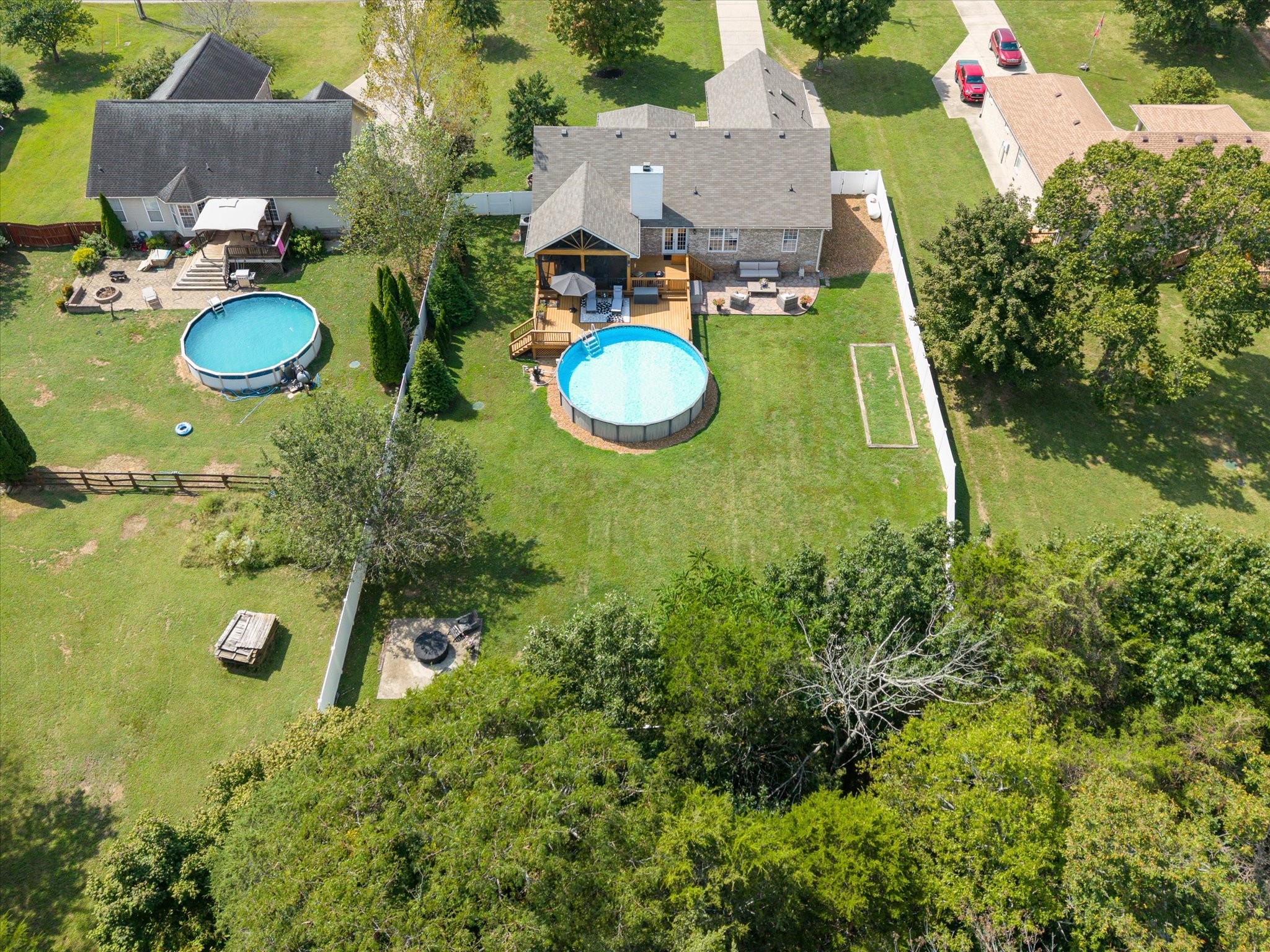 560 Windy Road Mount Juliet, TN 37122 - Photo 37 of 40 a aerial view of a house with a swimming pool yard and outdoor seating