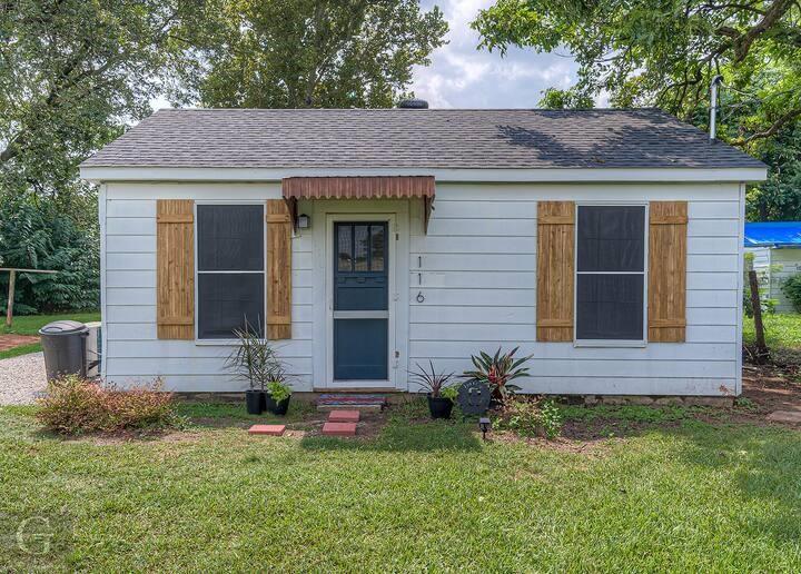 116 Loop Street Bossier City, LA 71111 - Photo 1 of 21 a front view of a house with a yard