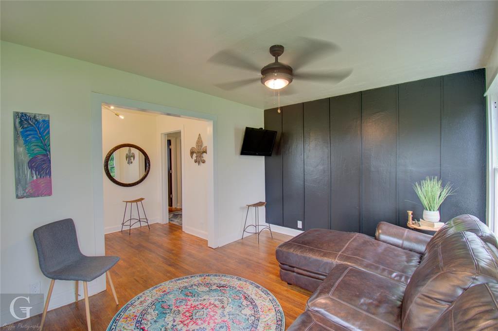 116 Loop Street Bossier City, LA 71111 - Photo 12 of 21 a bedroom with a bed a chandelier with a dresser and a chandelier