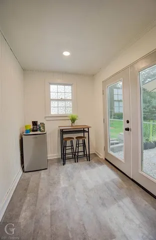 a room with furniture and window