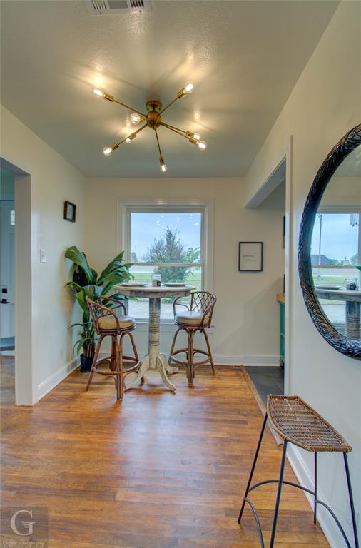 116 Loop Street Bossier City, LA 71111 - Photo 9 of 21 a view of a livingroom with furniture and a potted plant