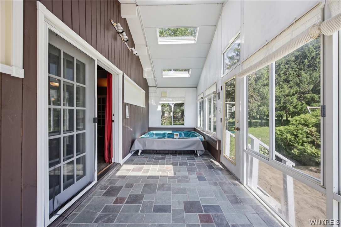 1635 Brant North Collins Road Brant, NY 14111 - Photo 10 of 36 Florida room with included hot tub