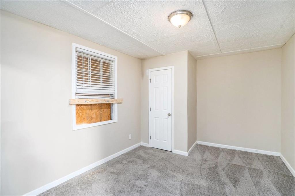 1714 Camperdown Circle Decatur, GA 30035 - Photo 14 of 15 a view of an empty room with a window