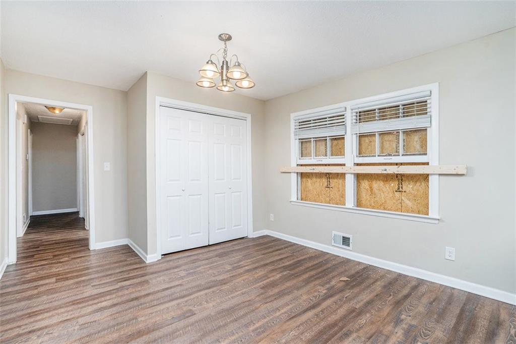 1714 Camperdown Circle Decatur, GA 30035 - Photo 3 of 15 a view of empty room with wooden floor and fan