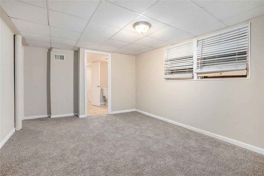 1714 Camperdown Circle Decatur, GA 30035 - Photo 8 of 15 an empty room with windows