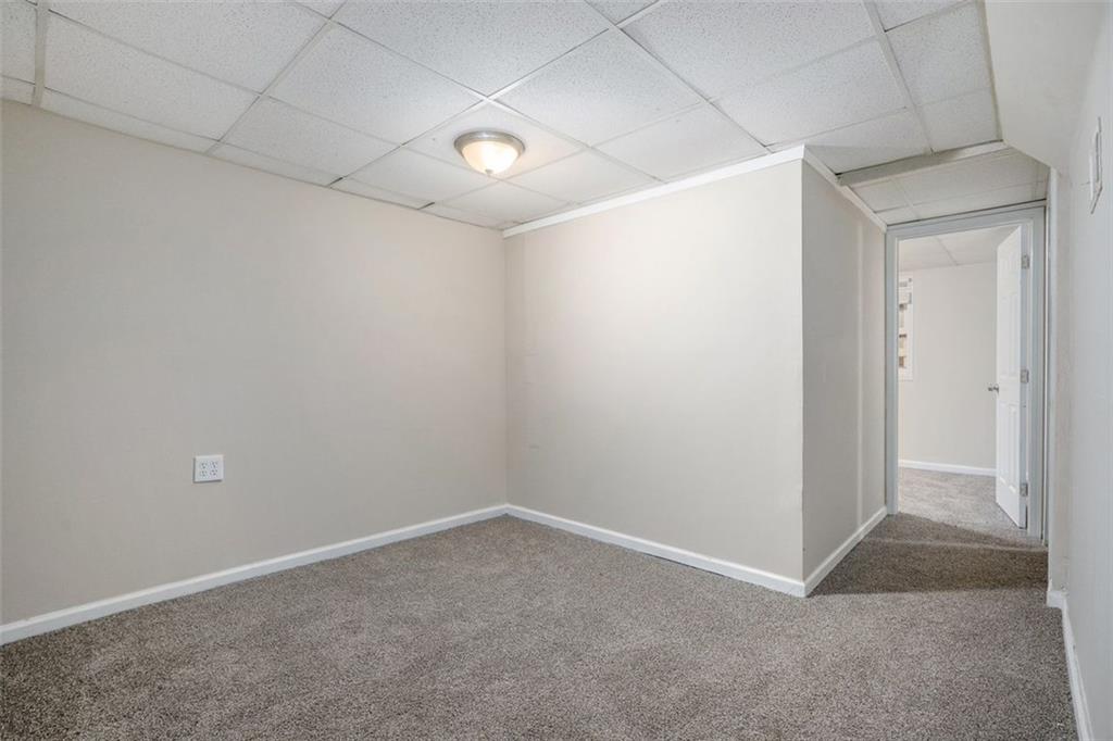 1714 Camperdown Circle Decatur, GA 30035 - Photo 9 of 15 an empty room with a empty space and a window