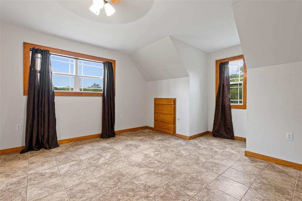 1321 North Fm 1970 Timpson, TX 75975 - Photo 14 of 29 an empty room with closet and a window