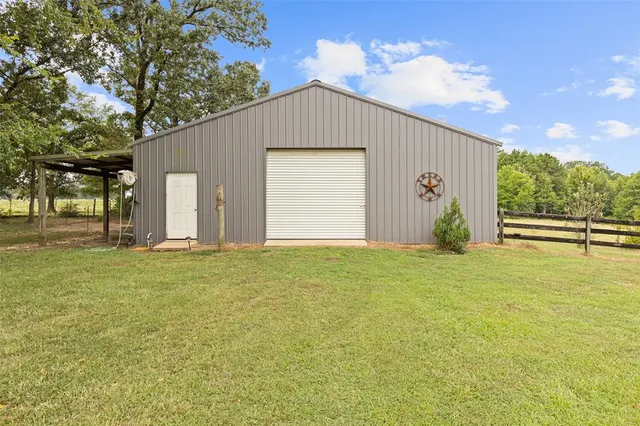 a view of a park with houses