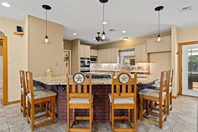 a front view of a house with a swimming pool