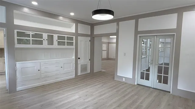 a view of a house with backyard and porch