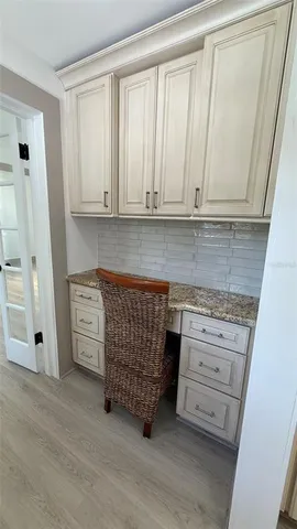 a view of an entryway and livingroom with furniture