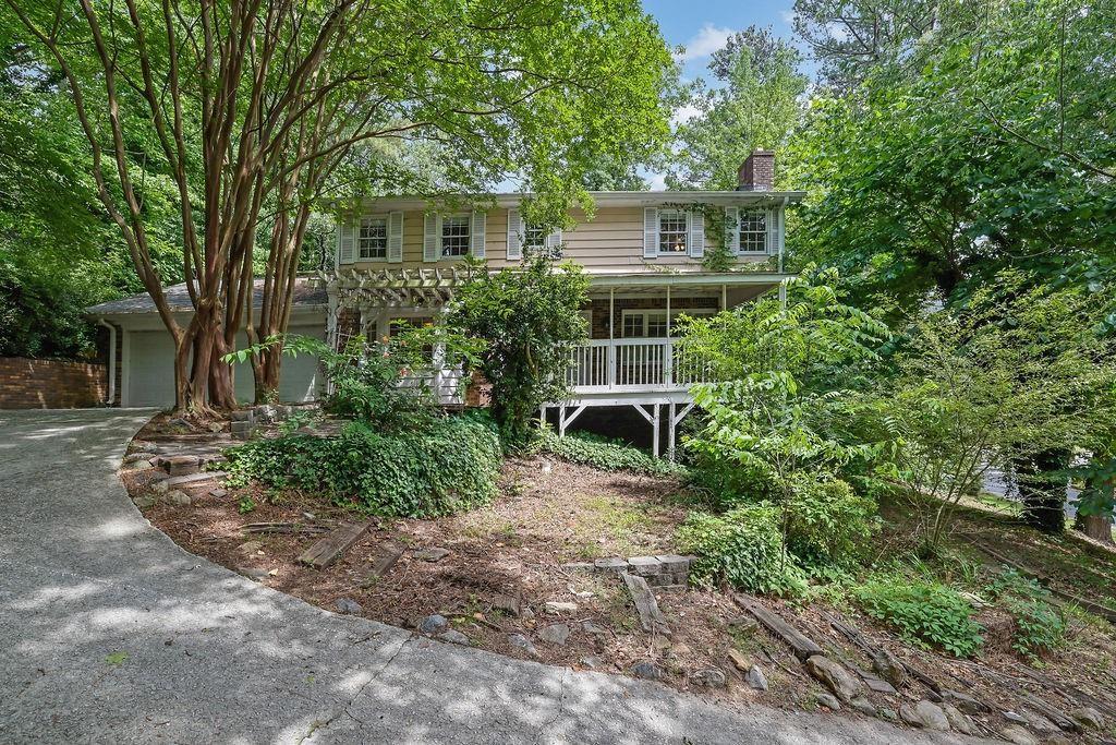 9480 Coleman Road Roswell, GA 30075 - Photo 1 of 1 a house view with a outdoor space