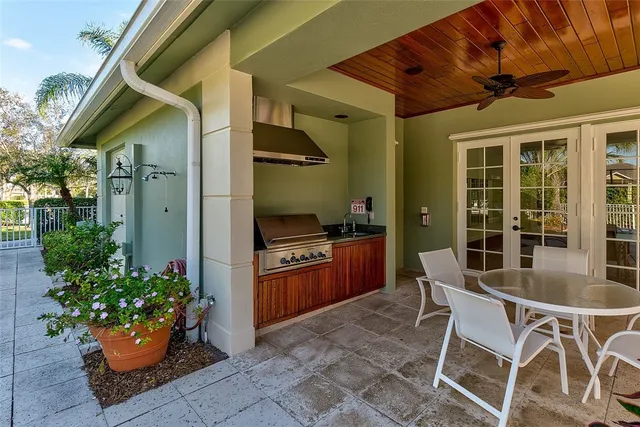 a outdoor space with a table and chairs