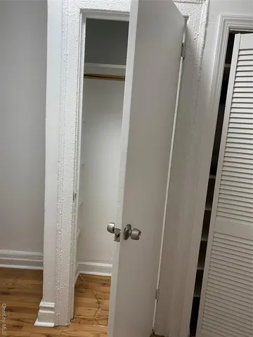 a view of a hallway with front door