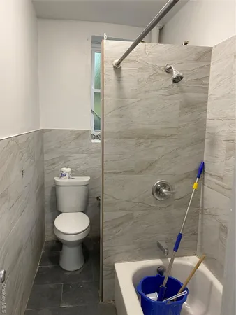 a kitchen with a stove and a refrigerator